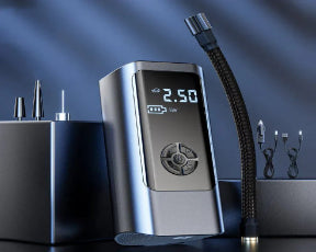 Digital tire pressure monitor with hose on a dark background